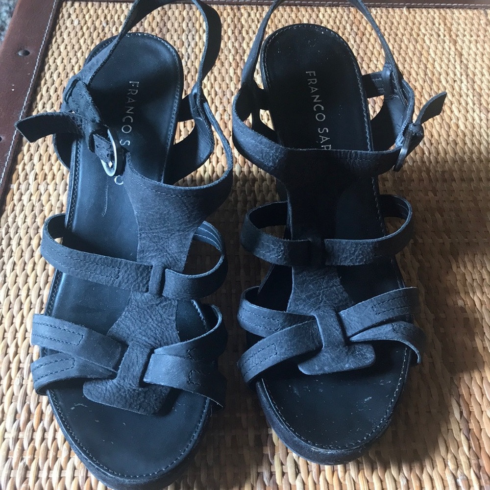 Black 4” wedge woman shoe.